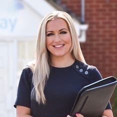 Female Gateway employee holding folder