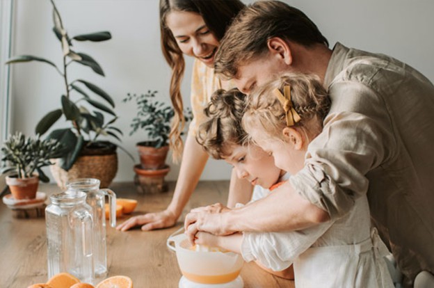 Parents making pastry with children