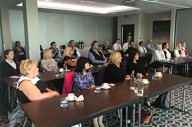 Gateway employees attending seminar hall