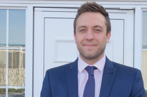 Michael Lawton, standing outside Gateway Group offices