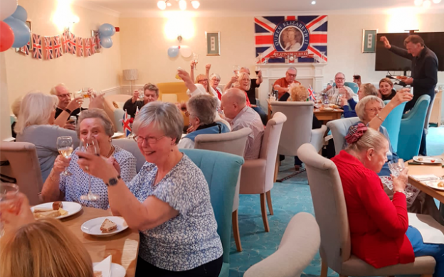A retirement community having party to celebrate Queen's Diamond Jubilee