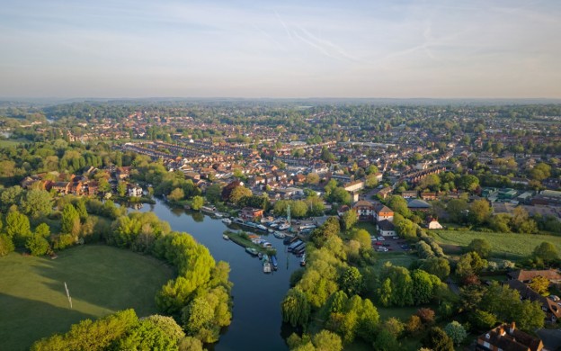 Aerial view of English countryside town and river