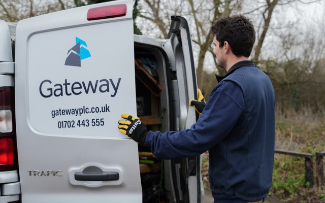 Gateway employee opening back of transit van