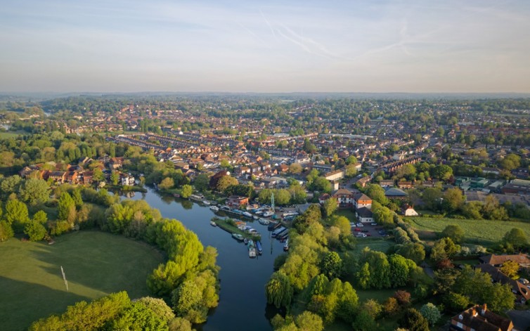 Aerial view of English countryside town and river